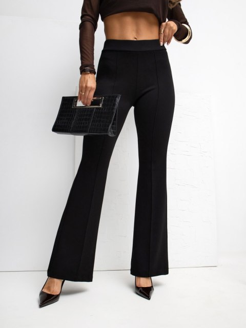 Czarne spodnie damskie dzwony masełko