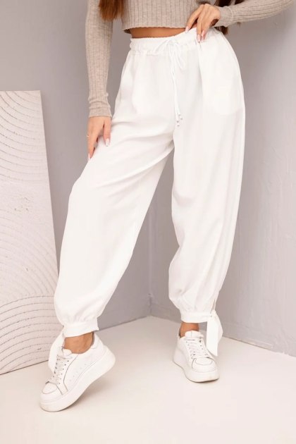 Spodnie damskie z szeroką nogawką i wiązaniem u dołu białe