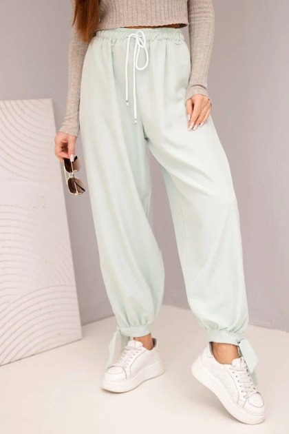 Spodnie damskie z szeroką nogawką i wiązaniem u dołu ciemno miętowe