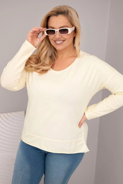 Bluzka damska Plus Size przecierana z dekoltem V i dłuższym tyłem żółta