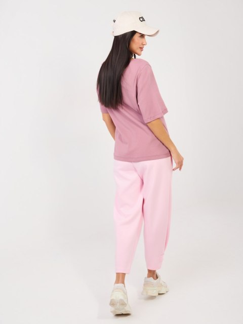 Różowe spodnie dresowe masełko