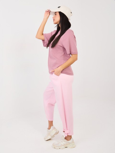 Różowe spodnie dresowe masełko