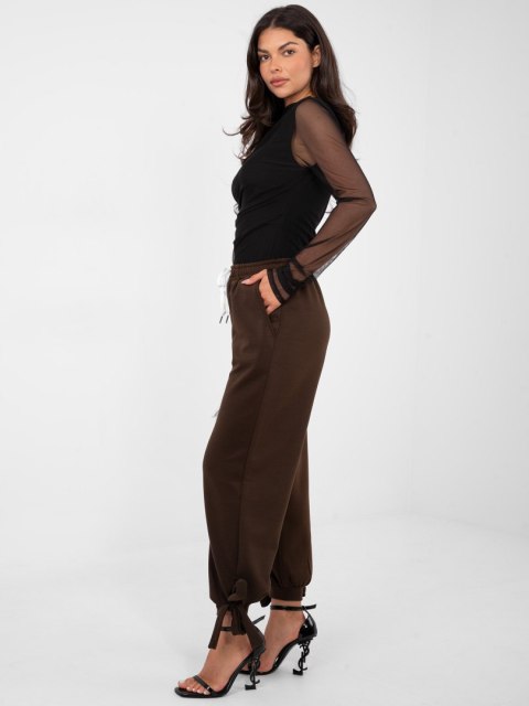 Ciemno brązowe spodnie dresowe masełko z wiązanymi nogawkami