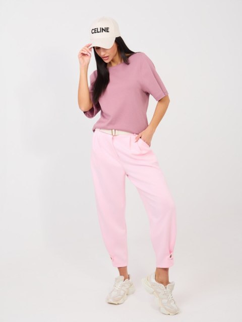 Różowe spodnie dresowe masełko