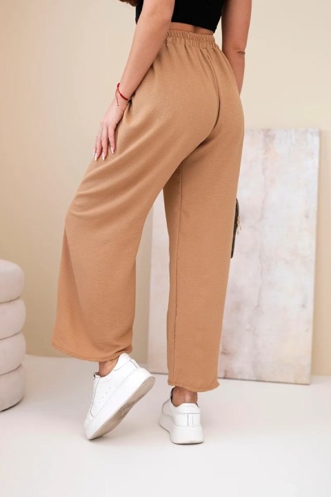 Eleganckie camelowe spodnie damskie z szeroką nogawką typu Wide Leg