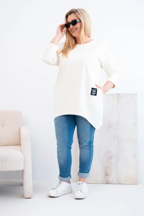 Bluzka damska Plus Size z dłuższym tyłem i długim rękawem jasno beżowa