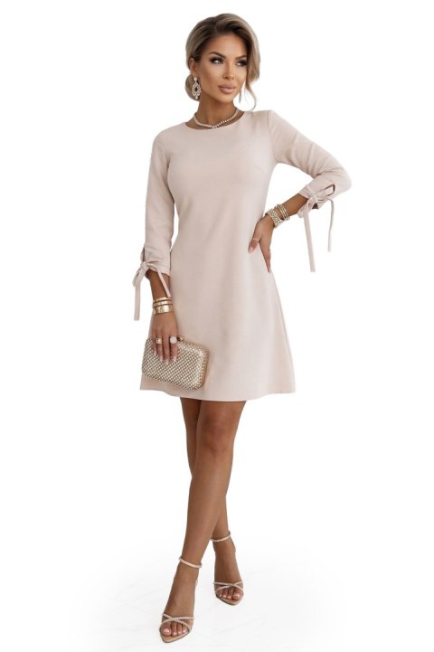 195-12 ALICE Trapezowa sukienka mini z kokardą i wiązanymi rękawami - beżowa