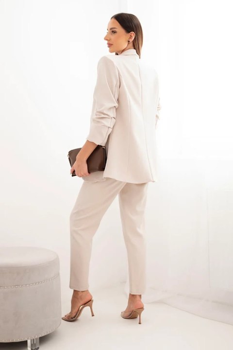 Komplet elegancki marynarki ze spodniami beżowy