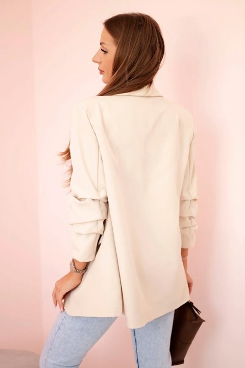 Beżowa marynarka damska z klapami