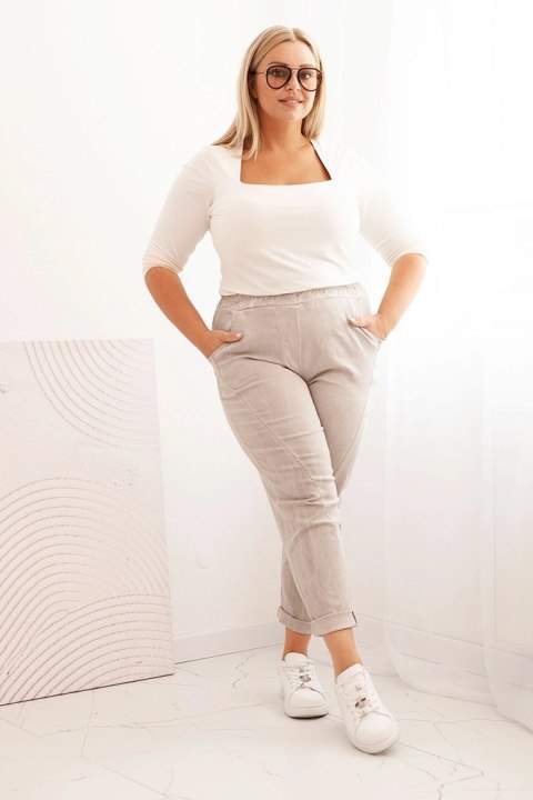 Spodnie damskie dekatyzowane Plus Size z gumką i kieszeniami beżowe
