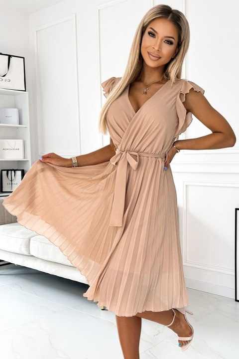 Elegancka beżowa sukienka plisowana z falbankami